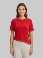 BLUSA SIMÉTRICA CON ENCAJE