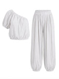 CONJUNTO TOP ASIMÉTRICO Y PANTALÓN FLUIDO