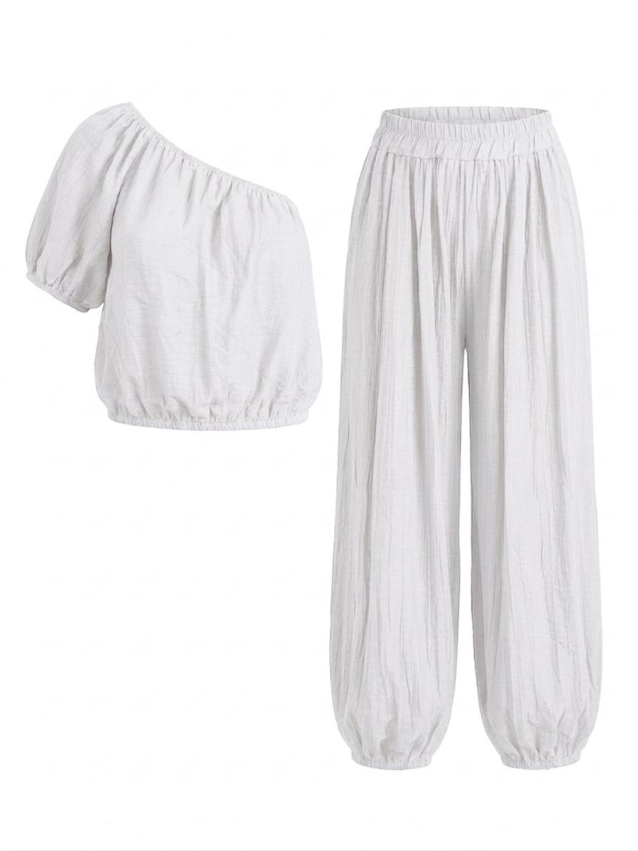CONJUNTO TOP ASIMÉTRICO Y PANTALÓN FLUIDO
