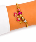 PULSERA DORADA CON DIJES