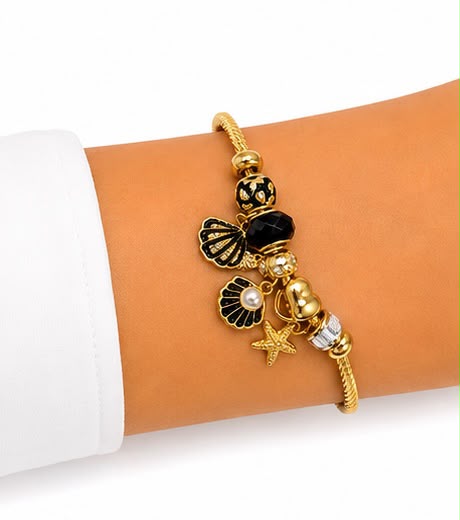 PULSERA DORADA CON DIJES