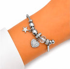 PULSERA PLATEADA CON DIJES