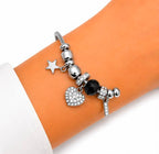 PULSERA PLATEADA CON DIJES