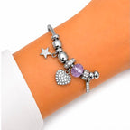 PULSERA PLATEADA CON DIJES