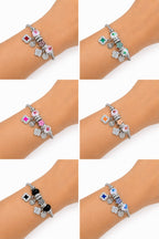 PULSERA PLATEADA CON DIJES