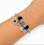 PULSERA PLATEADA CON DIJES