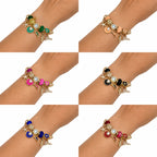 PULSERA PLATEADA CON DIJES