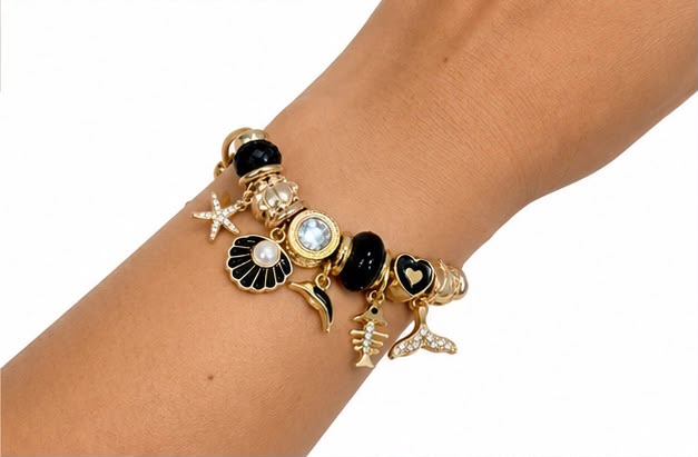PULSERA PLATEADA CON DIJES
