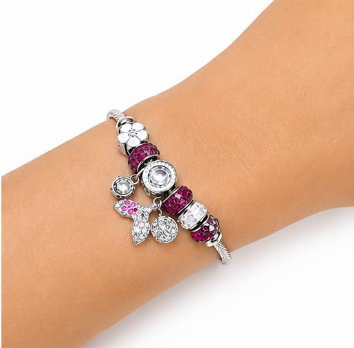 PULSERA PLATEADA CON DIJES
